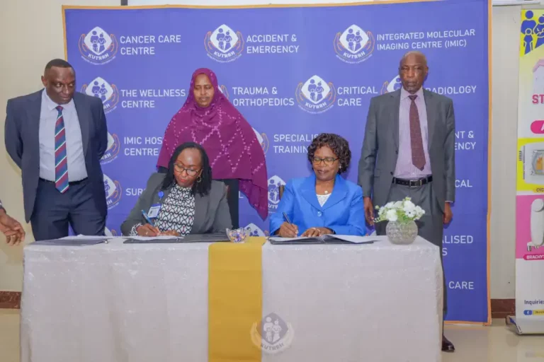 KUTRRH and Kenyatta University Solidify Partnership for Enhanced Medical Training KUTRRH and Kenyatta University leadership, including Mr. James Wambu and Prof. Paul Wainaina, formalize the cooperative agreement.