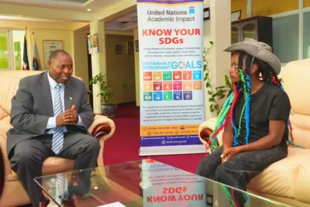 Mount Kenya University Awards Scholarship to Environmentalist Truphena Muthoni Mount Kenya University officials present talks to environmentalist Truphena Muthoni on December 17, 2025.